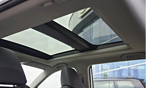 A large, dimensionally stable automotive sunroof frame A large, dimensionally stable automotive sunroof frame